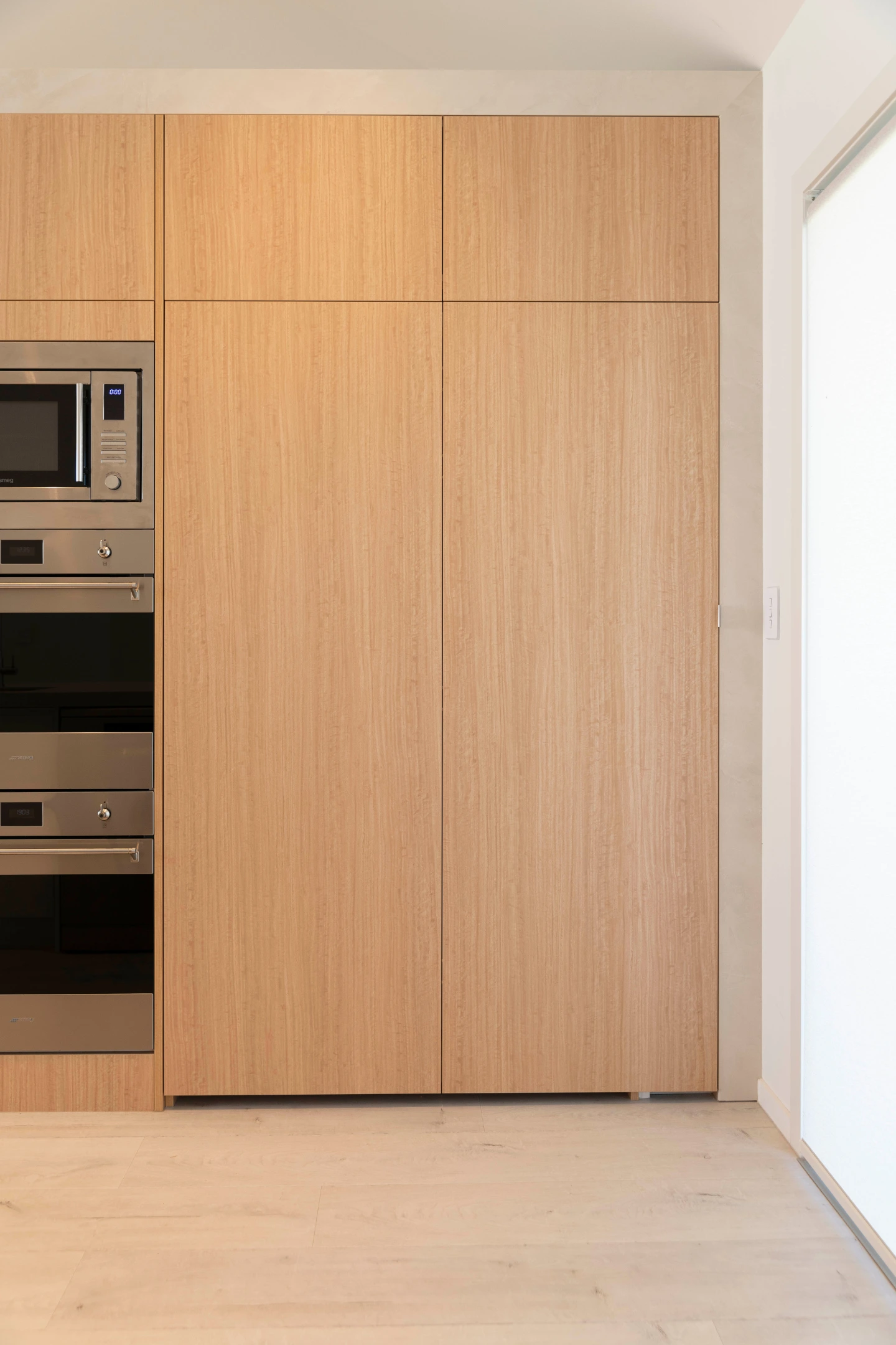 luxury-kitchen-renovation-bay-of-plenty Luxury kitchen remodel with italian pocket slider doors